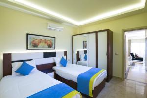 Ένα ή περισσότερα κρεβάτια σε δωμάτιο στο Serenity Home Hurghada +136 φωτογραφίες