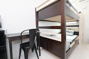 Postel nebo postele na pokoji v ubytování RUMa INN Rokugoudote