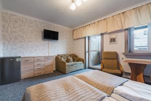 Imagen de la galería de Pokoje Gościnne i Apartamenty Krupówki 19, en Zakopane