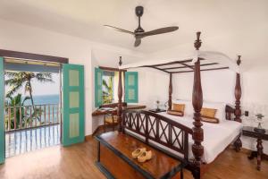 Giường trong phòng chung tại Jetwing Lighthouse, A Luxury Reserve
