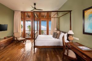 Giường trong phòng chung tại Jetwing Lighthouse, A Luxury Reserve