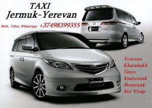 a picture of a silver car parked next to another car at Jermuk Apartment in the Center in Jermuk