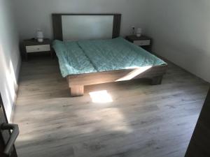 Postel nebo postele na pokoji v ubytování Apartments Lena