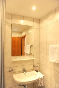 Kúpeľňa v ubytovaní Pension Olympia