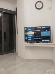 TV a/nebo společenská místnost v ubytování Penghu Summer Aroma Homestay + 18 fotografií
