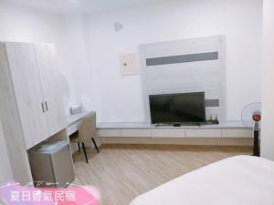 Penghu Summer Aroma Homestay TV 또는 엔터테인먼트 센터