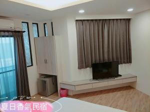 Penghu Summer Aroma Homestay 객실 침대