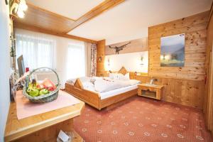A bed or beds in a room at Ferienhaus Kirchplatzl