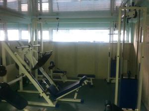a room with a gym with a treadmill at Molodizhniy Hostel in Lviv
