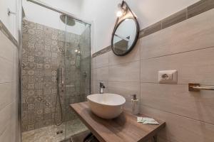 Un baño de Multifunctional Apartment San Pietro