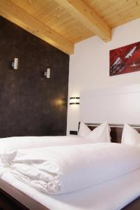 Posteľ alebo postele v izbe v ubytovaní Astellina hotel-apart