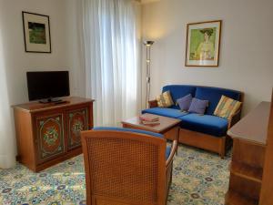 A television and/or entertainment centre at Residence L'Ulivo
