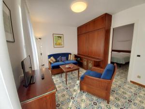 A television and/or entertainment centre at Residence L'Ulivo