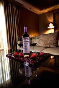 Nápoje v ubytování Nexus Valladolid Suites & Hotel
