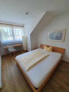 Postel nebo postele na pokoji v ubytování Hotel Neuenfels