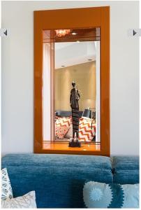 a room with a mannequin in front of a mirror at Azur 3000 in Saint-Laurent-du-Var