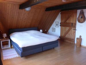 Postel nebo postele na pokoji v ubytování Altes Fischerhaus