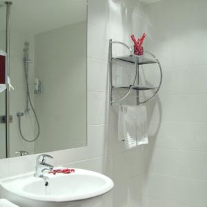 Koupelna v ubytování Hanse Hotel
