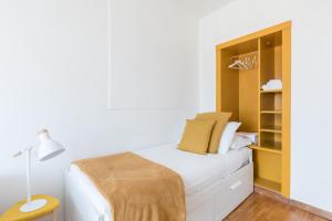 Posteľ alebo postele v izbe v ubytovaní Amazing penthouse with private terrace in Trastevere