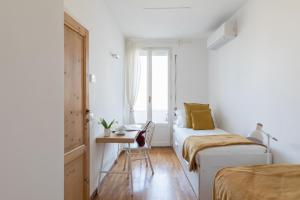 Posteľ alebo postele v izbe v ubytovaní Amazing penthouse with private terrace in Trastevere