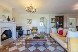 TV a/nebo společenská místnost v ubytování La Perla 1501