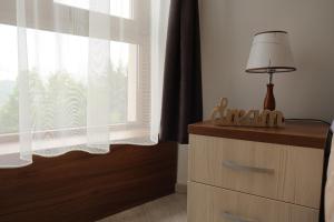 Postel nebo postele na pokoji v ubytování Apartman D&V Milmari Resort S10