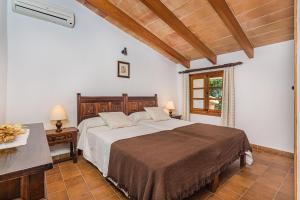 A bed or beds in a room at Picassa Még 22 kép