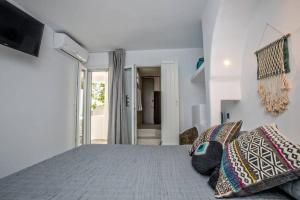 Кровать или кровати в номере Beachside Villa Agios Sostis