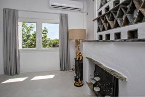 Фотография из галереи Beachside Villa Agios Sostis в городе Агиос-Состис