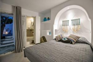 Кровать или кровати в номере Beachside Villa Agios Sostis