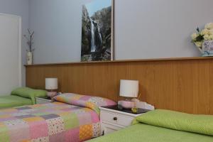 Posteľ alebo postele v izbe v ubytovaní Albergue Turístico Silleda