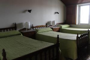 Posteľ alebo postele v izbe v ubytovaní Albergue Turístico Silleda