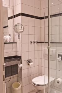Koupelna v ubytování Astor & Aparthotel