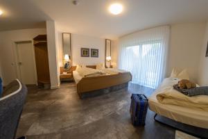 Cama ou camas em um quarto em Hotel- Restaurant Zum Schwan