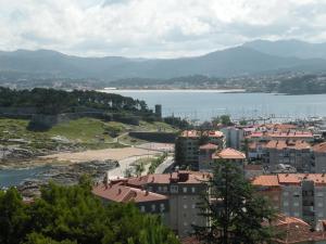 a view of a city and a body of water at Casa Marinera "Tu casa de Baiona" in Baiona