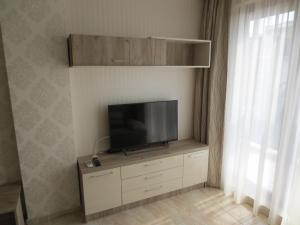 TV a/nebo společenská místnost v ubytování PORTO PARADISO Apart Complex