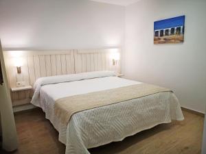 Postel nebo postele na pokoji v ubytování AG Apartamentos en Conil