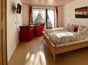 Postel nebo postele na pokoji v ubytování Landhaus Nagelfluh