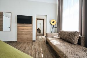 TV a/nebo společenská místnost v ubytování Lounge-Hotel Seeterrassen