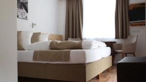 Posedenie v ubytovaní Berghotel-Gasthof Gstrein
