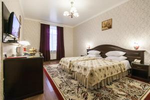 Cama o camas de una habitación en Sokol Hotel