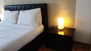 Postel nebo postele na pokoji v ubytování B&B in Arena L' Opera
