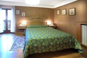 Postel nebo postele na pokoji v ubytování Hotel Principe