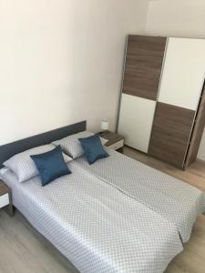 Postel nebo postele na pokoji v ubytování Apartments Lena