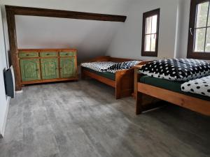 Voodi või voodid majutusasutuse Apartmány Svatá toas