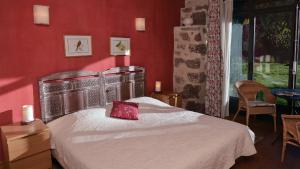 Ένα ή περισσότερα κρεβάτια σε δωμάτιο στο Lac De Malaguet