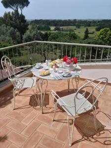 A balcony or terrace at IV Casale Roma Country Villa