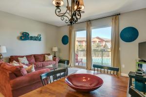 a living room with a couch and a table at The Beach Resort in Destin