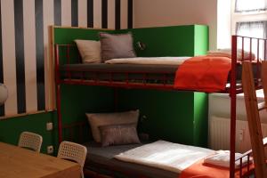 Krevet ili kreveti na sprat u jedinici u okviru objekta Altstadtcafé und Pension