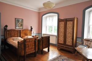 Postel nebo postele na pokoji v ubytování Husby Säteri + 37 fotografií